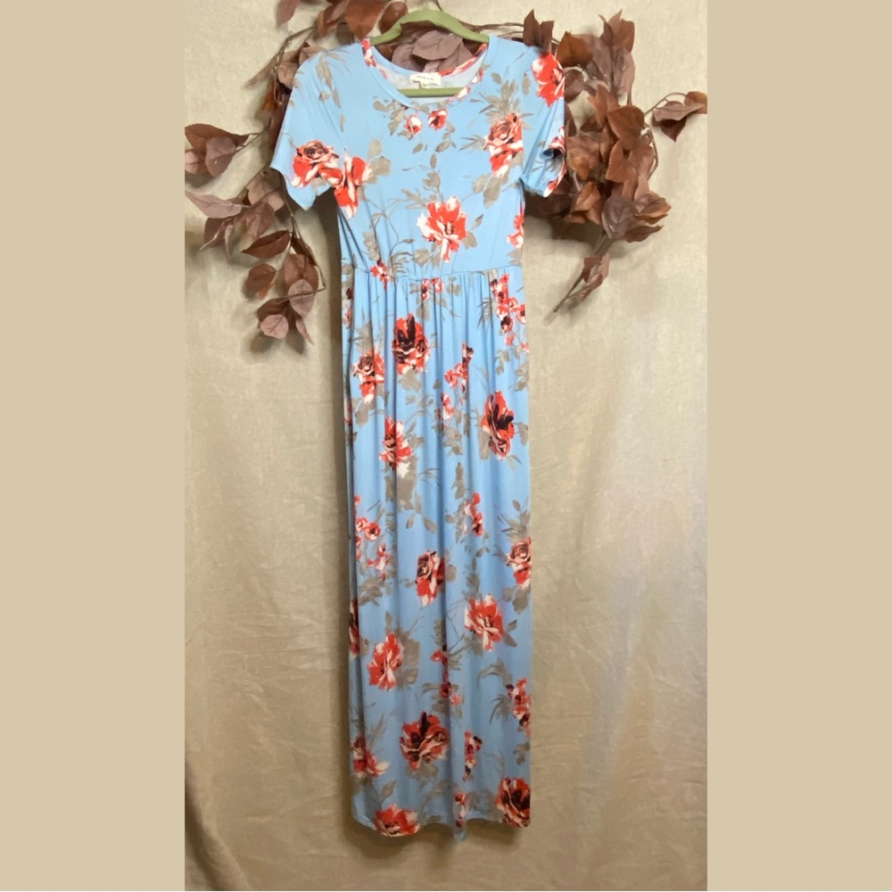 Blue floral maxi dress with pockets.